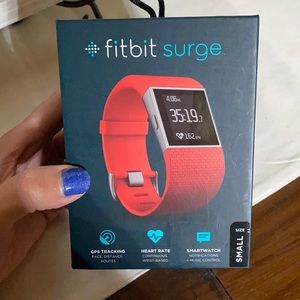 Size small orange Fitbit surge